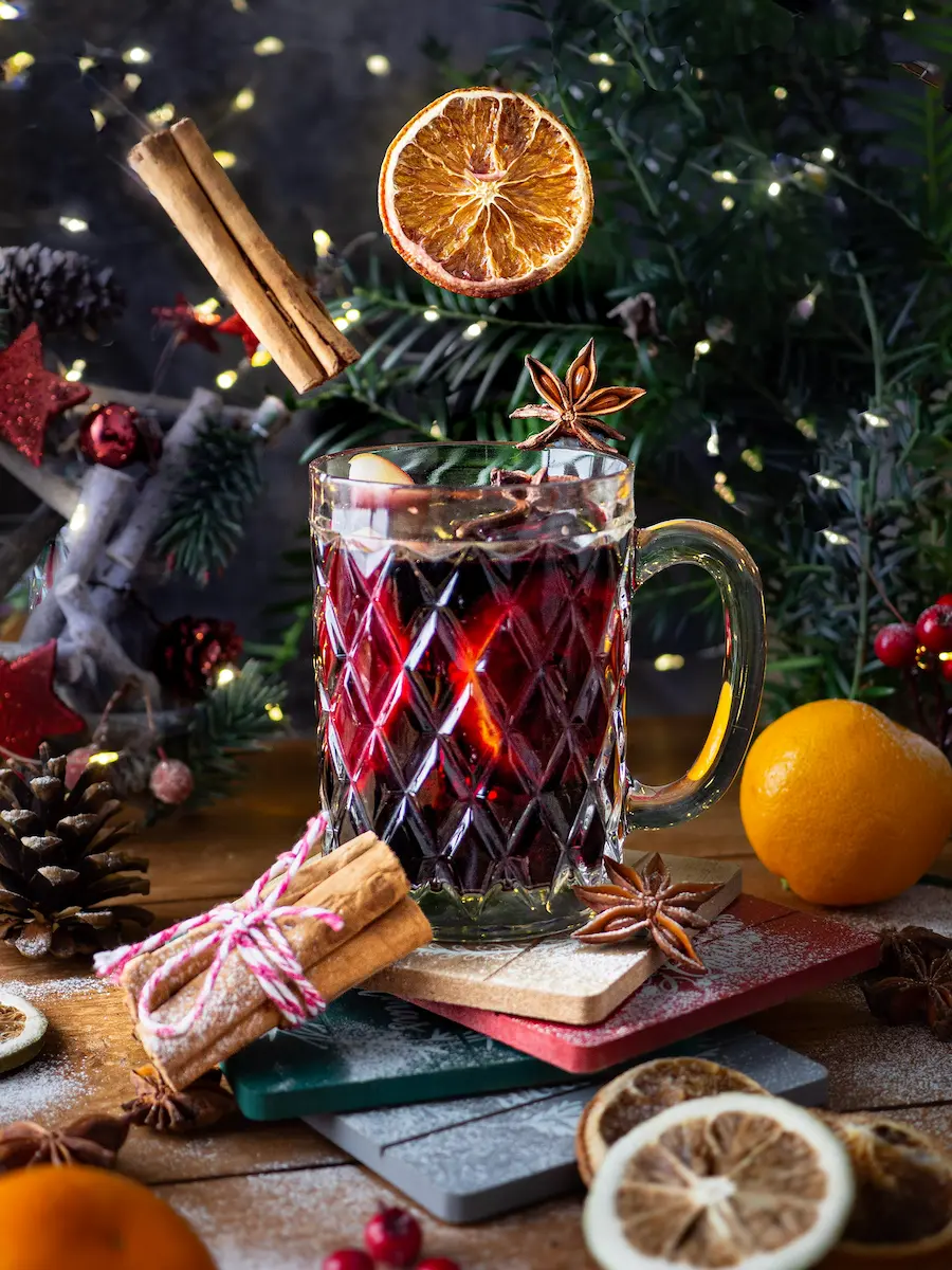 Creative levitation shot of spiced winter drink for cafe menu